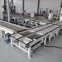 托盤輸送線 L 型布局：電動轉(zhuǎn)盤 vs 移載機(jī)區(qū)別與選型指南